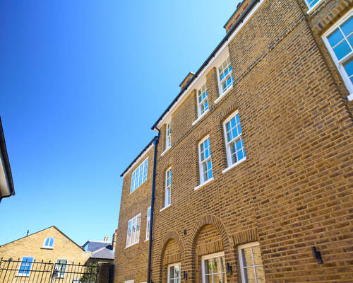 White timber on London brick