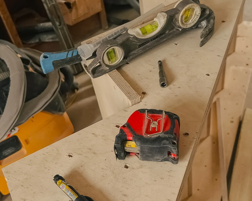 Level and laser tools on joinery